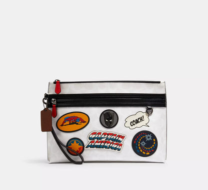 (READY STOCK🇲🇾) Coach │ Marvel Carryall Pouch In Signature Canvas With Patches